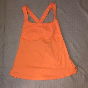 Lululemon neon orange tank top with cross cross back